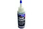A bottle of Deluxe Materials Liquid Gravity weighting system for model hobbyists, featuring a clear plastic bottle filled with small metal spheres.