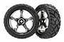 Two Traxxas 2.2 inch Anaconda front tires pre-mounted on chrome five-spoke Tracer wheels.