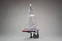 Kyosho Fortune 612 III RC racing yacht on a display stand with its included radio transmitter.