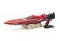 Kyosho Jetstream 888VE RC speed boat in red and black livery, displayed on a wooden stand with its pistol-grip transmitter.