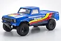 Kyosho Outlaw Rampage 1/10 scale RC trophy truck in blue with yellow and red racing decals on a white background.