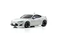 A studio shot of a pearl white Kyosho Mini-Z Toyota 86 RC car on a white background.