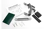 Traxxas battery hold down kit including grey plastic mounts, foam pads, metal posts, and body clips with an instruction sheet.