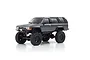 A studio shot of a Kyosho Mini-Z Toyota 4Runner Hilux Surf RC rock crawler in dark grey metallic finish on a white background.