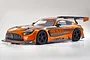 Kyosho Inferno GT2 VE 2020 Mercedes-AMG GT3 RC car in orange and grey livery, studio shot on white background.