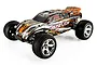 Traxxas Rustler 1/10 scale 2WD electric RC stadium truck with black, white, and orange body graphics on a white background.