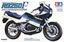 Box art for Tamiya 1/12 scale Suzuki RG250 Gamma motorcycle model kit, showing a white, blue, and black sportbike.