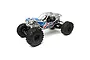 Axial RBX10 Ryft 1/10 scale RC rock racer kit with blue and white body panels, grey roll cage, and large off-road tires against a white background.