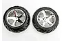 Two Traxxas 2.8 inch Anaconda tires pre-mounted on chrome All-Star rims, viewed from the front against a white background.