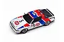 A 1/24 scale model of a Mitsubishi Starion Gr.A race car in white, red, and blue STP livery with number 5 on the hood and doors.