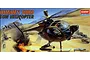 Box art for Academy 1/48 scale Hughes 500D TOW Defender helicopter plastic model kit showing the helicopter in flight over a desert battlefield.