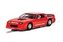 A red Scalextric 1/32 scale Chevrolet Camaro IROC-Z slot car with Budweiser livery and number 12 on a white background.