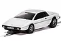 A white Scalextric 1/32 scale James Bond Lotus Esprit S1 slot car on a track, featuring the iconic wedge-shaped design and PPW 306R license plate.
