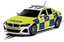A 1/32 scale Scalextric BMW 330i M Sport police slot car with yellow and blue high-visibility livery on a white background.
