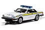 A 1/32 scale Scalextric Jaguar XJS police car model in white with blue and yellow livery, featuring a roof-mounted light bar and County Constabulary markings.