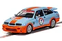 A 1/32 scale Scalextric Ford Sierra RS500 slot car in iconic light blue and orange Gulf racing livery with number 7 on the side.
