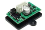 A Scalextric C8515 Easy Fit Digital Plug circuit board with a green PCB, white connector, and silver capacitor mounted on a black plastic base.