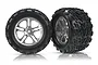 Two Traxxas 3.8 inch Talon tyres mounted on satin chrome split-spoke wheels, shown against a white background.