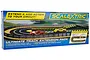 Scalextric Ultimate Track Extension Pack box showing a slot car track layout with a leap ramp and two toy cars.