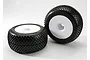 Two Traxxas 3.8 inch Response Pro RC monster truck tyres pre-glued onto white dish rims, shown against a plain white background.