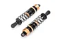 Two Maverick RC shock absorbers with gold aluminium bodies and black springs against a white background.