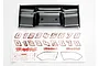 Traxxas Revo wing with an exo-carbon finish and an included decal sheet featuring numbers and Traxxas logos on a white background.