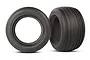Two black Traxxas 2.8 inch ribbed RC truck tyres with foam inserts, shown from front and side angles against a white background.