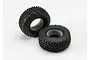 Two black Traxxas off-road RC tires with foam inserts, shown against a plain white background.