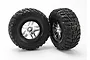 Two Traxxas 2.2/3.0 inch Kumho Road Venture MT tires mounted on satin chrome split-spoke wheels against a white background.