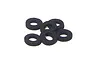 A small pile of six black circular foam washers against a plain white background.