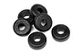 A cluster of six small, black, circular plastic spacers with a central hole, arranged on a white background.