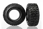 Two black Kumho Road Venture MT RC short course tyres with aggressive tread patterns, shown from front and side angles against a white background.