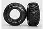 Two Traxxas BFGoodrich Mud-Terrain T/A KM2 RC tyres with white lettering on the sidewall, shown against a plain white background.