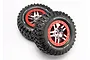 Two Traxxas 2.2/3.0 inch BFGoodrich Mud Terrain T/A KM2 RC tyres pre-mounted on chrome and red split-spoke wheels against a white background.