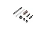 A collection of Losi Baja Rey steering hardware components including a threaded shaft, metal pin, coil spring, lock nut, bushings, and ball studs.
