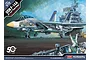Box art for an Academy 1/72 scale USN F-14A VF-143 Pukin Dogs model kit, showing an F-14 fighter jet on an aircraft carrier deck.