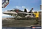 Box art for Academy 1/72 scale USN EA-18G Shadow Hawks model kit showing a fighter jet on an aircraft carrier deck with a flight deck crew member.