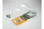 A clear, unpainted 1/10 scale Toyota 86 RC car body shell with included plastic accessory parts and decals on a white background.