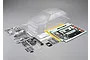 Killerbody 1/10 scale clear unpainted Lancia Delta HF Integrale RC body shell kit with plastic parts and decal sheet on a grey background.