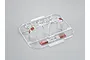 A plastic sprue containing clear and red-painted RC light lenses for a 1/10 scale Toyota Land Cruiser 70 body shell.