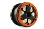 An orange and black aluminium beadlock wheel for an RC car, featuring a carbon fiber center detail and silver circular accents.