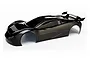 A glossy black pre-painted RC car body shell for the Traxxas XO-1 with an attached rear wing, viewed from a high angle against a white background.
