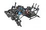 A studio shot of an assembled Element RC Enduro 1/10 scale RC truck chassis, showing the frame, suspension, and drivetrain components.