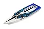 Top-down view of a white and blue Traxxas Spartan RC boat hull with geometric graphics.