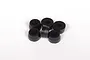 A set of six small black rubber bump stops for RC shock absorbers arranged on a white background.