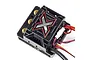 Castle Creations Mamba Monster X brushless ESC featuring a black casing with a prominent silver and red X logo on top.