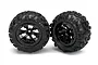 Two black Traxxas Canyon AT tires mounted on six-spoke Geode black rims, shown from a front-facing angle against a white background.