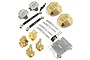 A collection of Yeah Racing metal chassis upgrade parts for the RBX10 Ryft, including brass diff covers, skid plates, drive shafts, and mounting brackets.