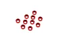 A collection of ten small red anodized aluminium M3 countersunk washers arranged on a plain white background.