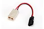 A Traxxas adapter cable with a white Tamiya connector on one end and a black receiver-style connector on the other, connected by red and black wires.
